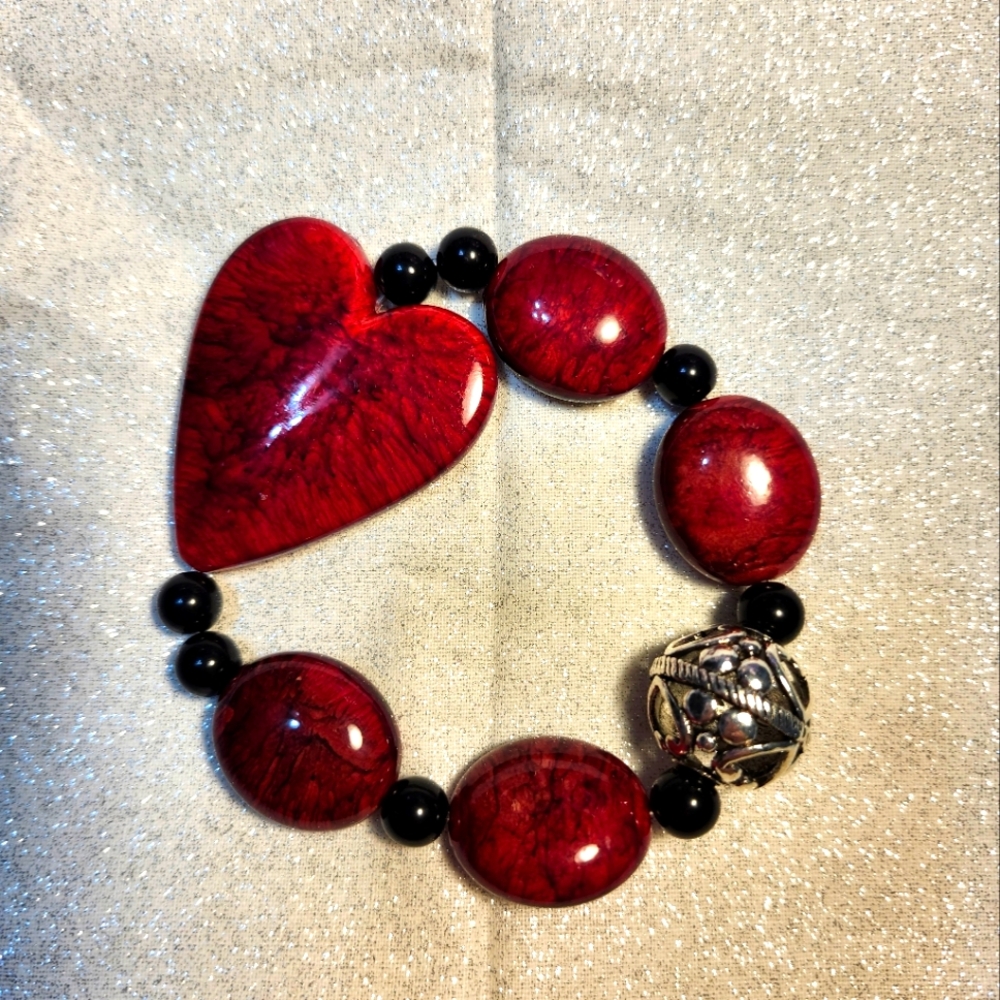 Red and black Heart bracelet with a Metal bead or bangle. Great gift idea.